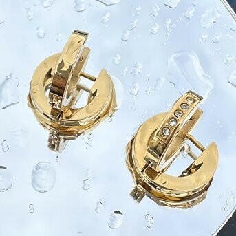 Earrings,18k gold plated steel.